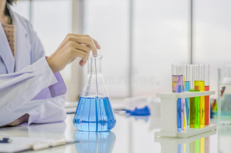 Lab Testing Products By chemist, women, and chemistry experiments, liquid colors for everyday chemicals To develop safe for consu