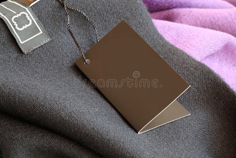 Label (price tag) on wear stock images Label (price tag) on wear stock images