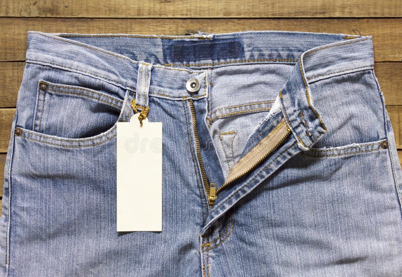 Label Tag and Jeans on Wood Background Stock Image Image of knot