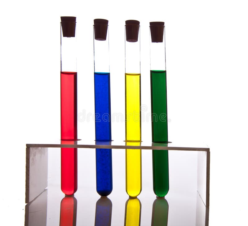 Labolatory glassware with colorful fluids isolated