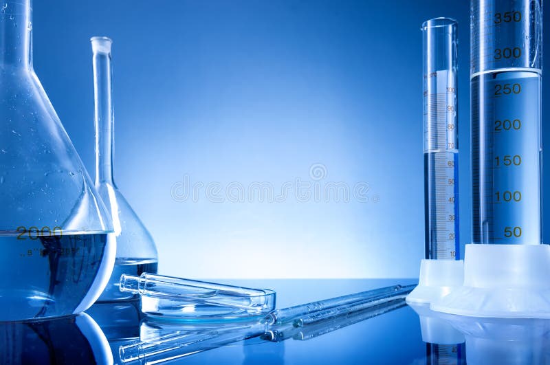 Laboratory equipment, bottles, flasks on blue background. Laboratory equipment, bottles, flasks on blue background