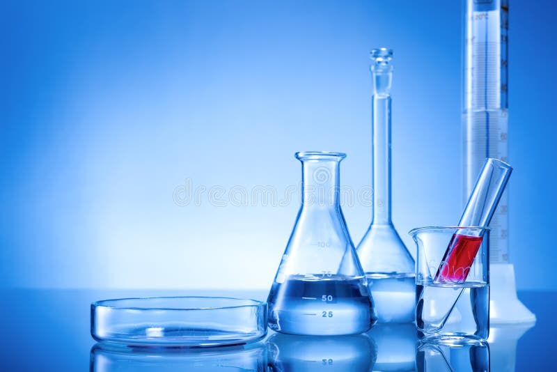 Laboratory equipment, glass flasks, pipettes, red liquid on blue background. Laboratory equipment, glass flasks, pipettes, red liquid on blue background