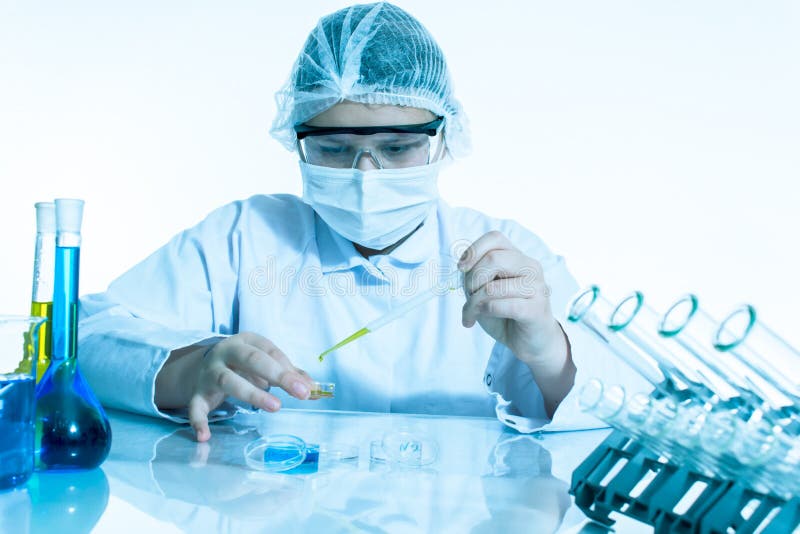Laboratory assistant analyzing a sample royalty free stock photo