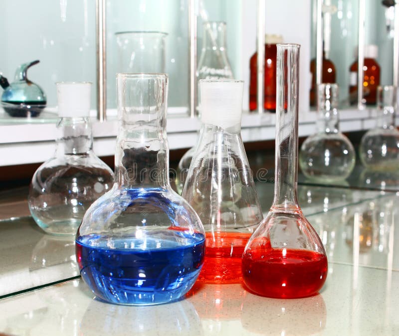 Laboratory beakers with the coloured liquid stock photo Laboratory beakers with the coloured liquid stock photo