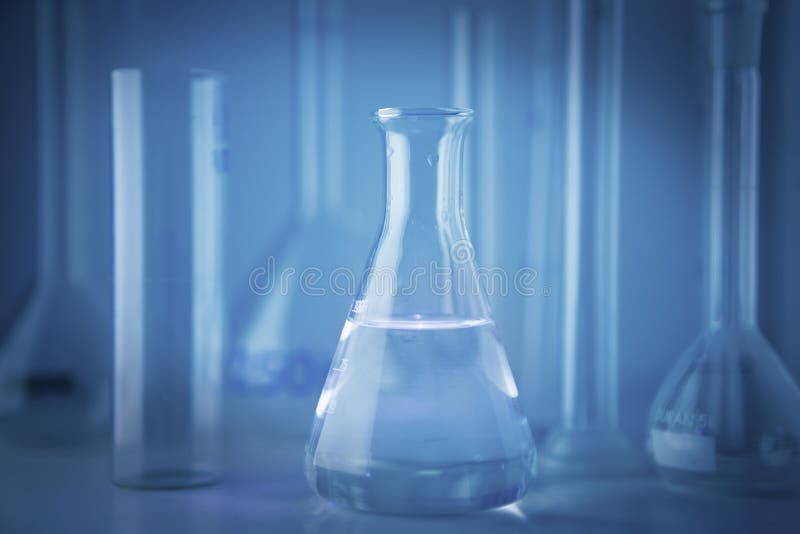 Laboratory flask isolated on a background stock images