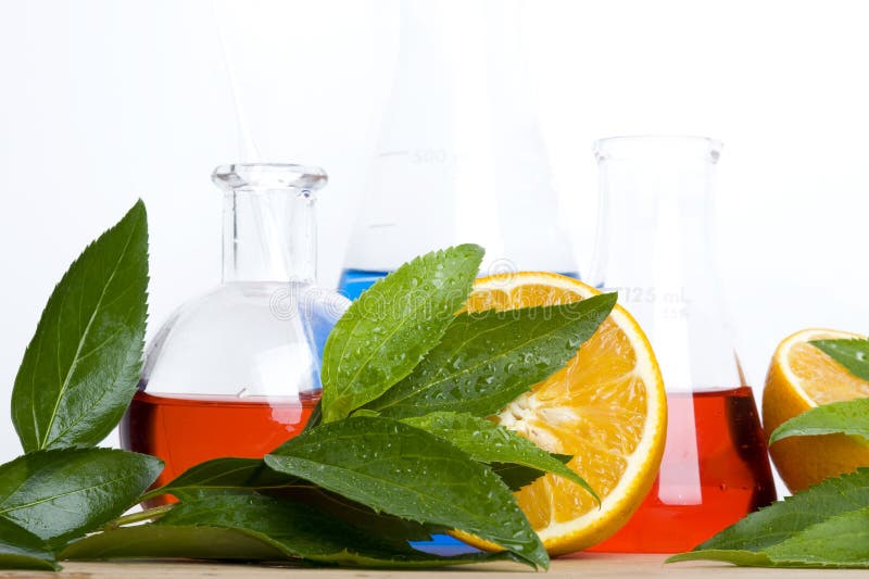 Laboratory flask and orange