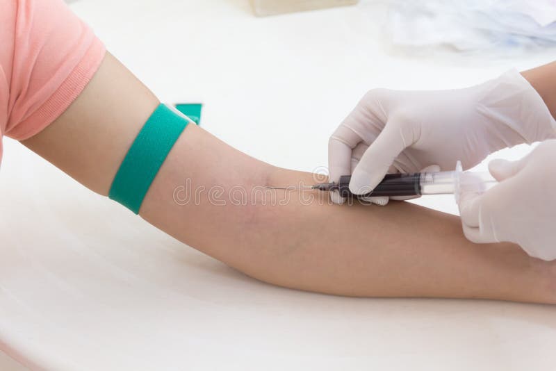Laboratory with Nurse Taking Blood Sample from Patient Stock Photo