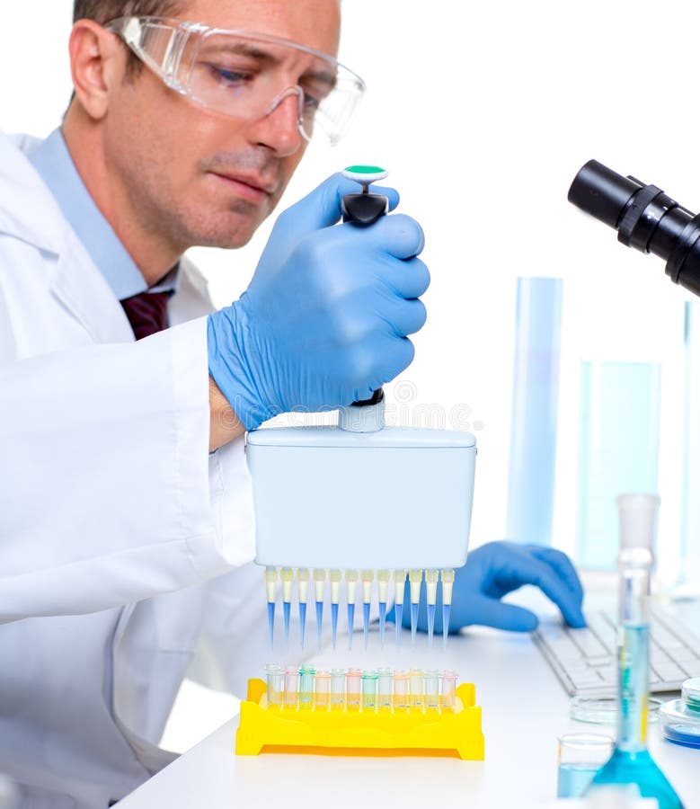 Laboratory scientist using a multi channel pipette