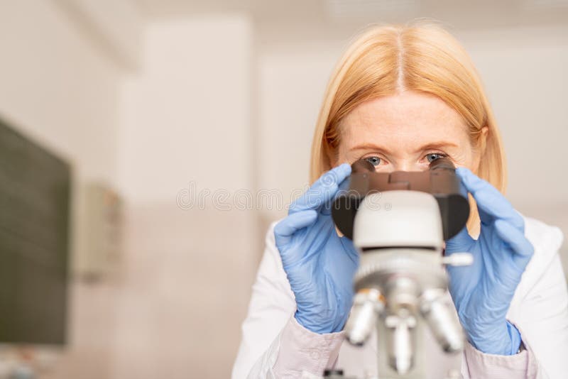Laboratory Specialist Using Microscope Stock Image Image of