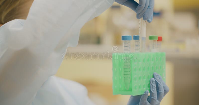 Laboratory Technician Analyzing Test Tubes stock footage