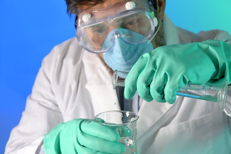 Scientist Mixing Chemicals stock photo. Image of equipment 26910050