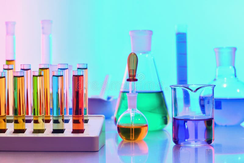 Laboratory glassware with colorful chemicals and reagents, chemistry science. Laboratory glassware with colorful chemicals and reagents, chemistry science