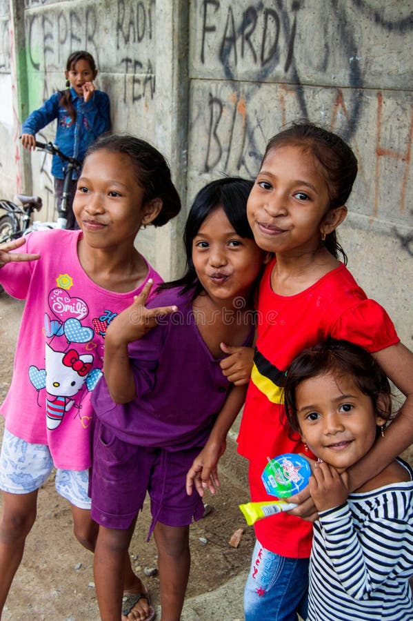 Indonesian Children Looking At The Camera With Funny Faces Out Of The ...