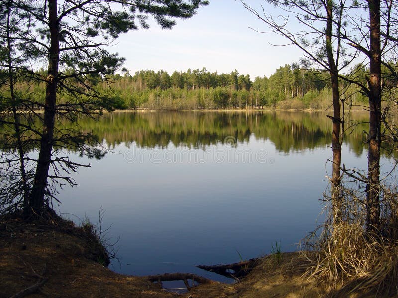 A peaceful lake in Estonia in early spring. A peaceful lake in Estonia in early spring.