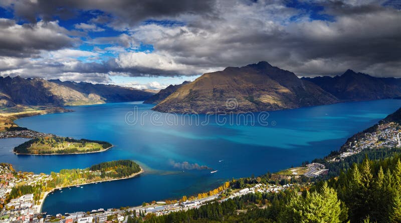 Queenstown cityscape with Wakatipu lake and Remarkables Mountains, New Zealand. Queenstown cityscape with Wakatipu lake and Remarkables Mountains, New Zealand