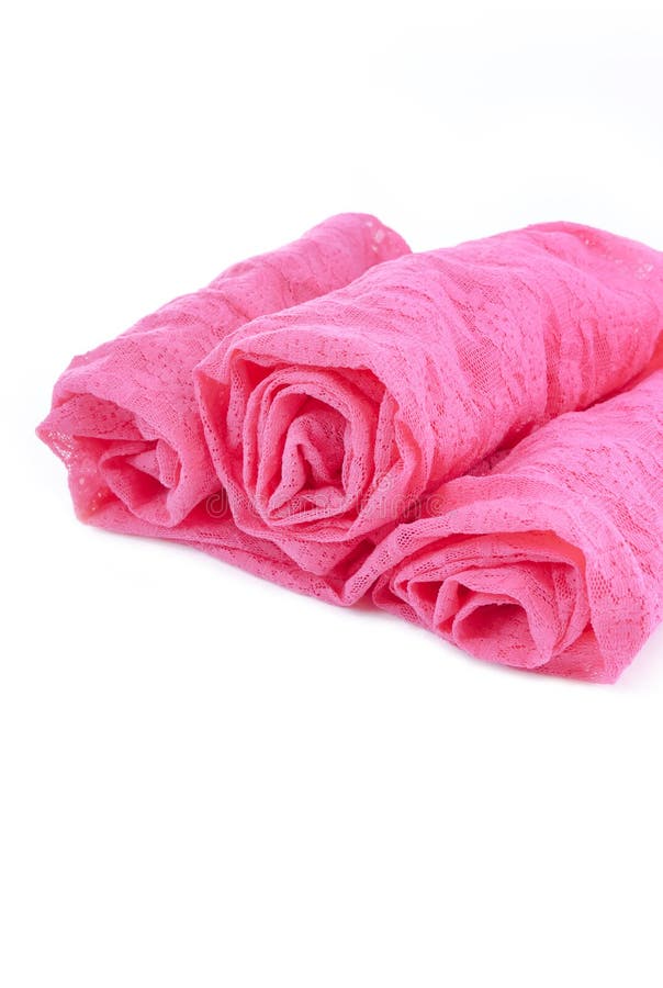 Lace background red pink flower rose synthetic fabric textile network openwork. Red lace with flower`s pattern or print. Openwork pink lace on the white background