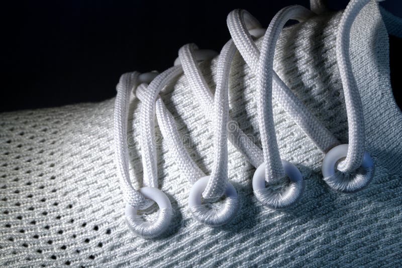 Laces and Eyelets of Running Shoe, Close Up. on Black Background. Stock  Photo - Image of mesh, shadow: 218330718