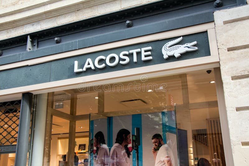 Lacoste Store with Fashionable and Luxury Products, Logo, Sign. French  Clothing Company, Founded by Tennis Player Rene Lacoste Editorial Image -  Image of mall, famous: 168410865