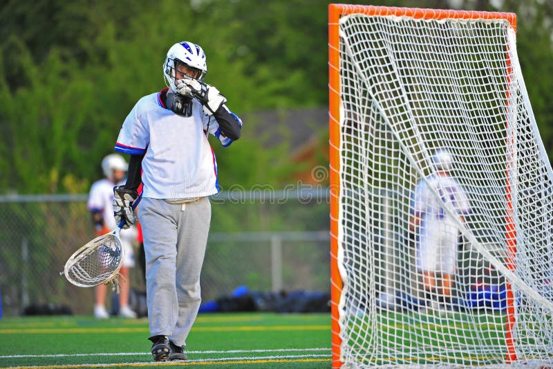 Lacrosse Goalie Wiping His Face Stock Photo Image of action, keeper