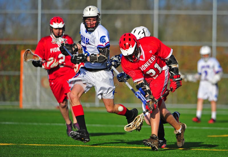 Lacrosse que coge la bola imágenes de archivo libres de regalías Lacrosse que coge la bola imágenes de archivo libres de regalías