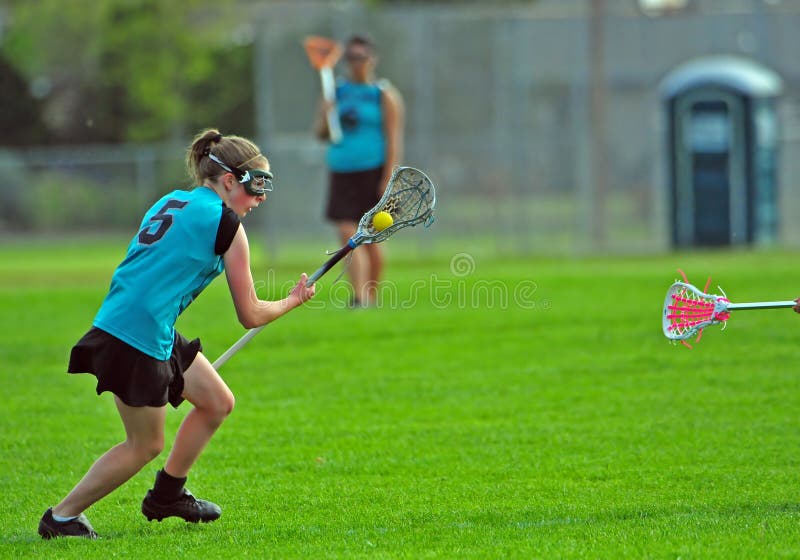 lacrossespelarekvinnor royaltyfri bild lacrossespelarekvinnor royaltyfri bild