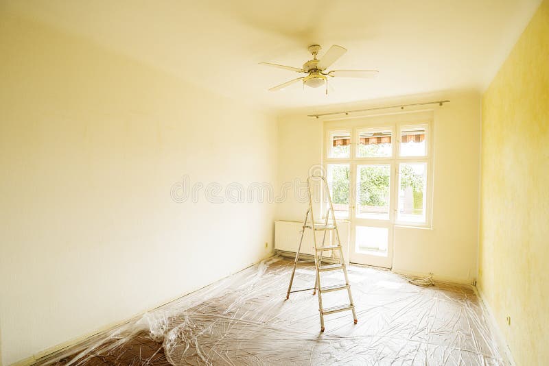 Ladder in empty room stock photo Ladder in empty room stock photo
