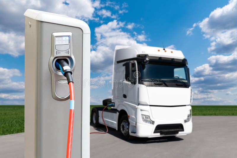 Electric vehicles charging station on a background of a truck. Concept. Electric vehicles charging station on a background of a truck. Concept