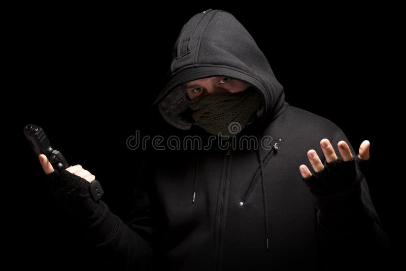 Thief with gun - isolated on black background. Thief with gun - isolated on black background