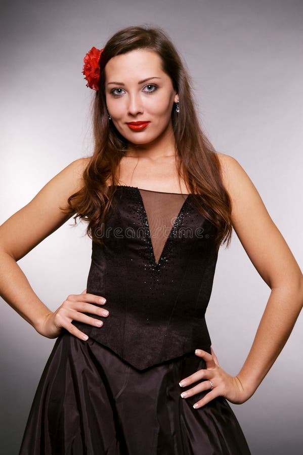 Lady In Black Dress With Flower In Her Hair Stock Image Image of