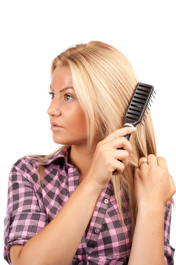 Lady brushing her hair stock image. Image of lady, brush 15158065