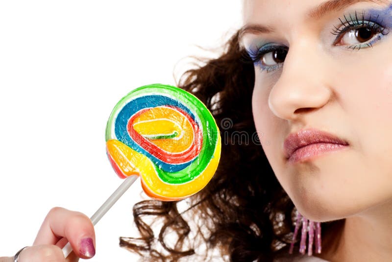 Lady and candy stock image. Image of lollipop, sensual 12715907