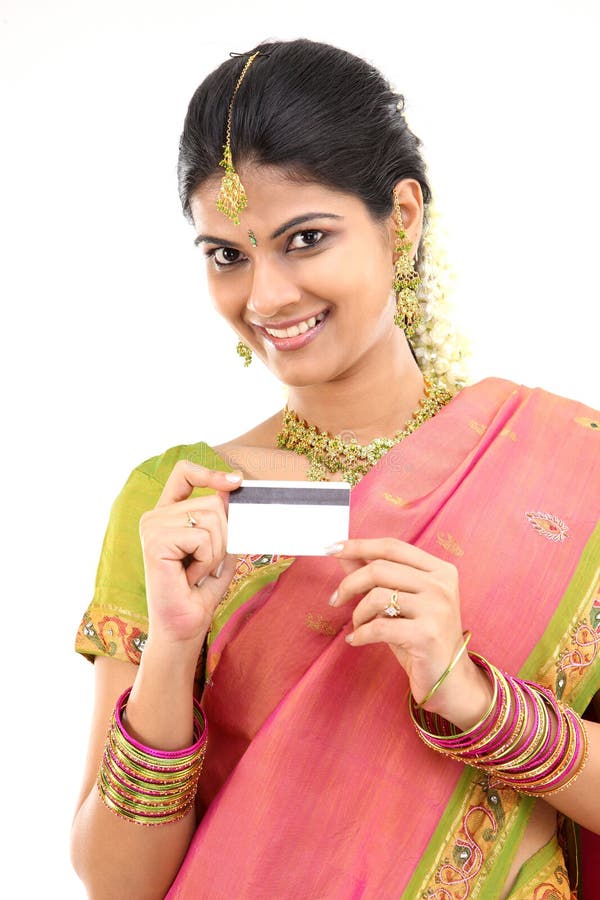 Lady with credit card in silk sari royalty free stock photos