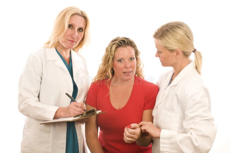 Lady doctors medical clothes with patient stock photo Lady doctors medical clothes with patient stock photo