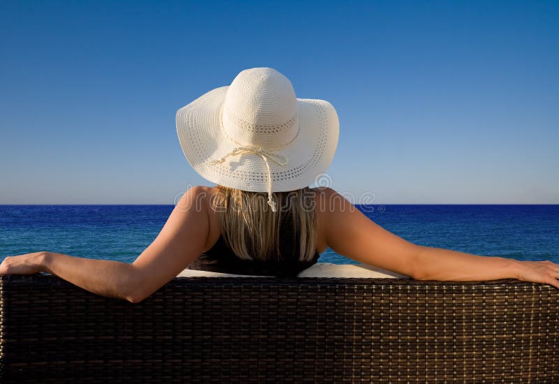 Lady enjoying a perfect view to the ocean