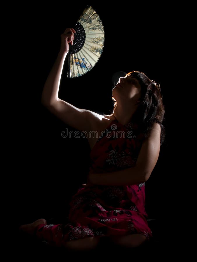 Lady with feather in night