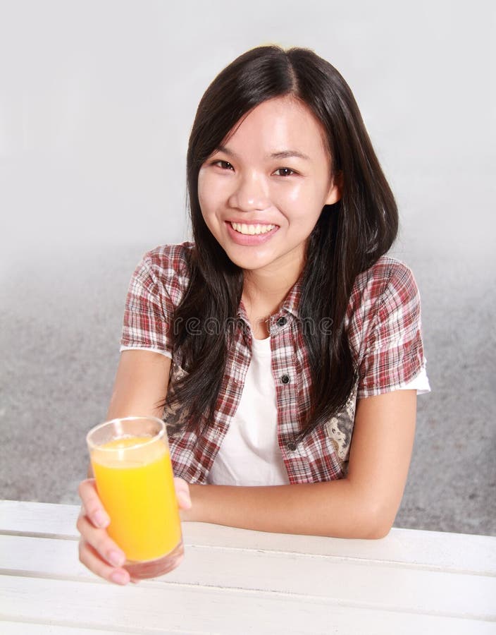 Lady Holding a Glass of Orange Juice Stock Image Image of lifestyle