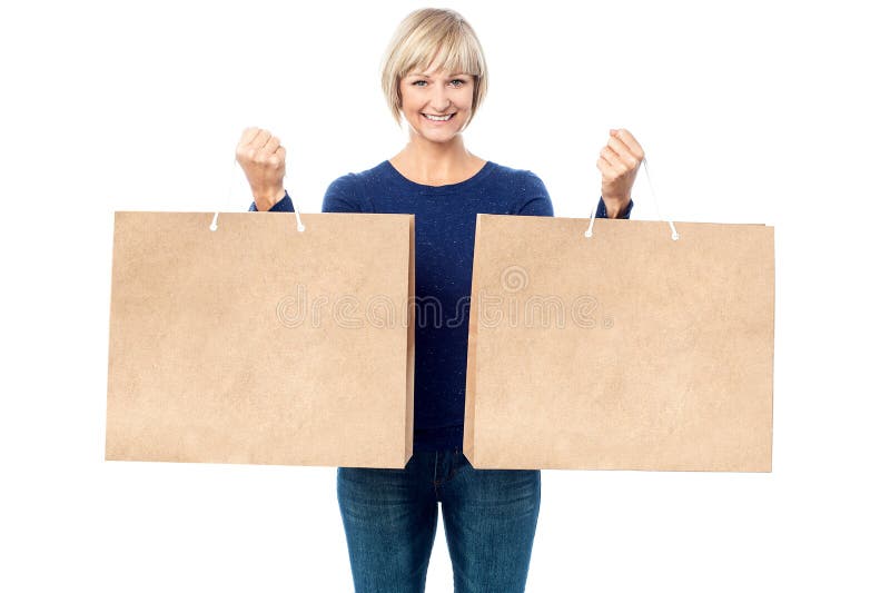 Lady holding paper shopping bags