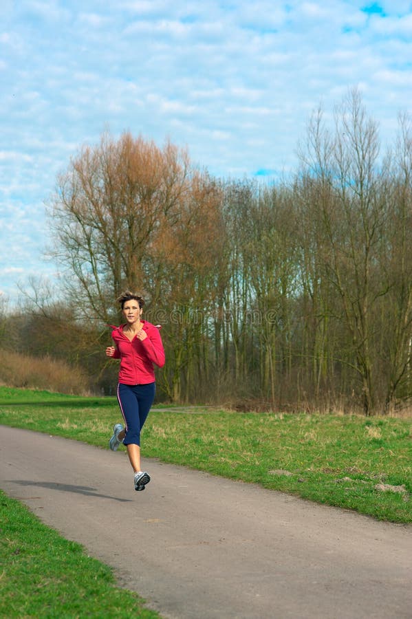 Lady Jogging in a Park