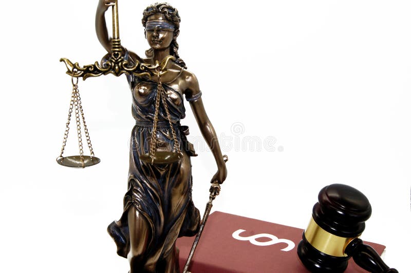 Lady Justizia with statute book and handcuffs
