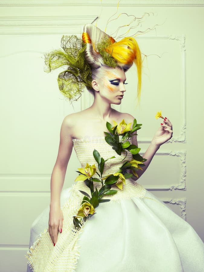 Lady with avant-garde hair and bright make-up. Lady with avant-garde hair and bright make-up
