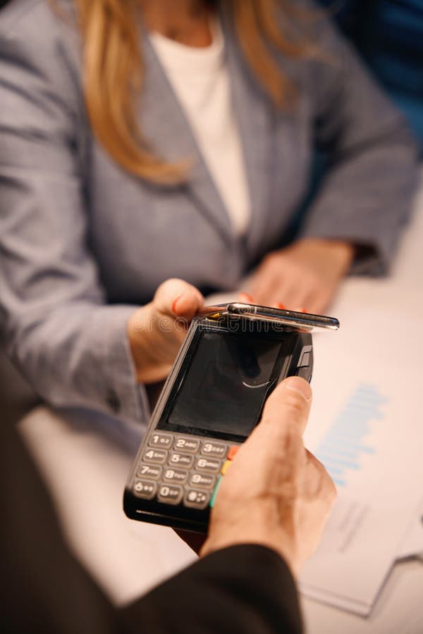 Lady Pays Bill in Restaurant Stock Photo - Image of indoors, comfortable: 312127826