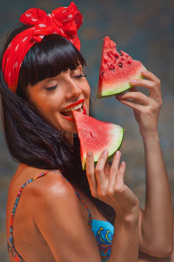 Lady at sea with watermelon.