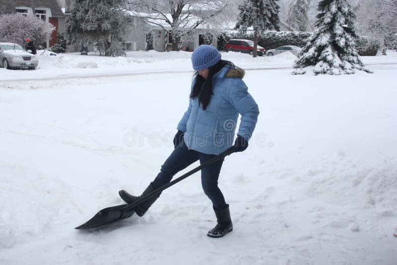 Lady Shoveling Snow stock image. Image of outdoors, path 39104713