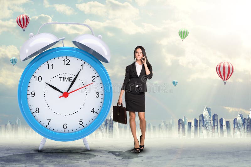 Woman Talking Cell Phone Big Alarm Clock Stock Photos Free & Royalty