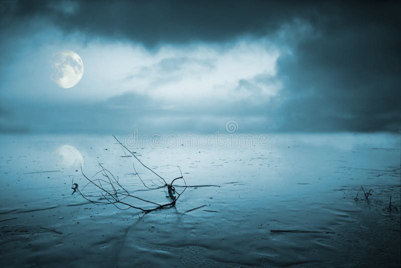 Huge moon over a frozen lake. Huge moon over a frozen lake