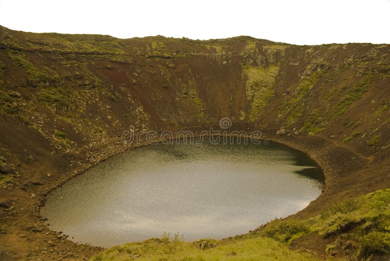 Lake in the crater of an extinct volcano. Landscape of Iceland. Lake in the crater of an extinct volcano. Landscape of Iceland
