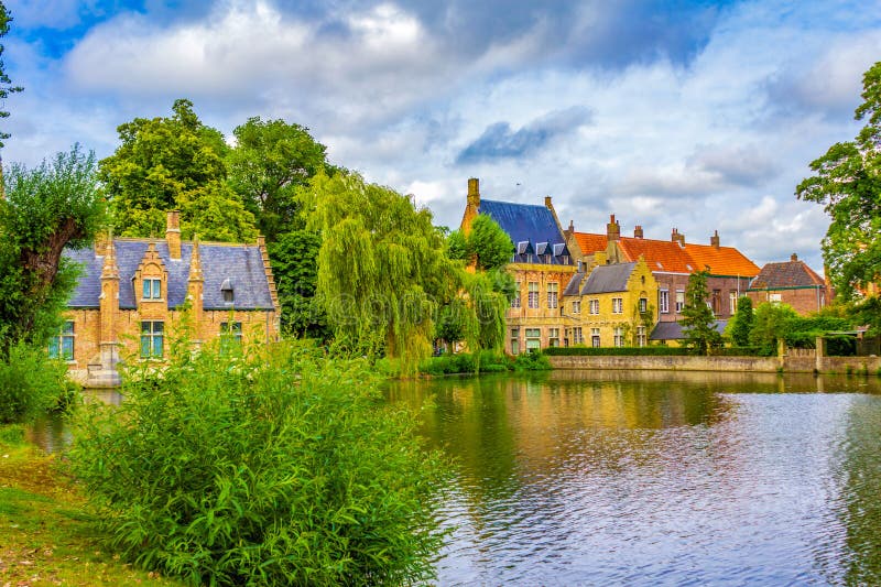 Sashuis Sluice House at lake Minnewater in Bruges, BelgiumSashuis. Sluice house, built in 1519 above the lock by the canalized lake Minnewater in Bruges. The building was restored at the end of the 19th century. the Lake of Love in Bruges, Belgium, fairytale scenery in Bruges. Bruges Brugge historic city is a prominent World Heritage Site of UNESCO.August 7th 2016. Sashuis Sluice House at lake Minnewater in Bruges, BelgiumSashuis. Sluice house, built in 1519 above the lock by the canalized lake Minnewater in Bruges. The building was restored at the end of the 19th century. the Lake of Love in Bruges, Belgium, fairytale scenery in Bruges. Bruges Brugge historic city is a prominent World Heritage Site of UNESCO.August 7th 2016