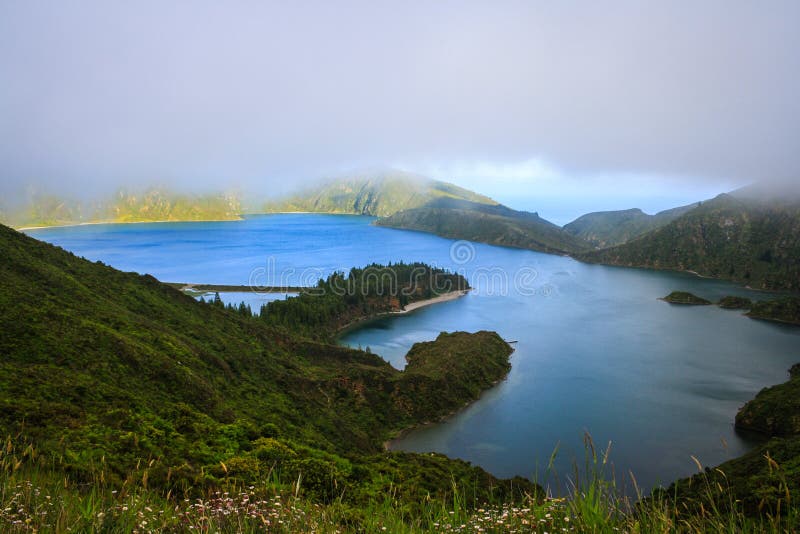 Lagoa do Fogo is a crater lake within the Agua de Pau Massif stratovolcano  in the center of the island of Sao Miguel in the Portuguese archipelago of  Stock Photo - Alamy