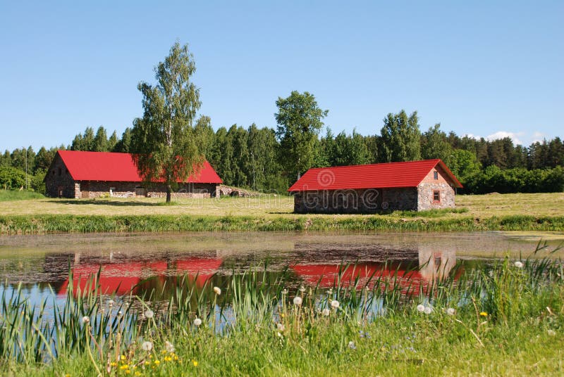 Two Stone Red Houses On The Pond. Two Stone Red Houses On The Pond