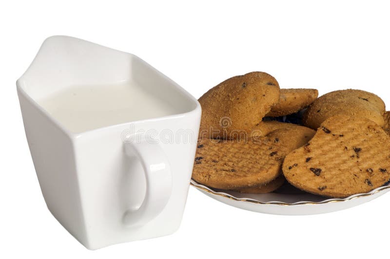 Lait et biscuits avec des pastilles de chocolat images stock Lait et biscuits avec des pastilles de chocolat images stock